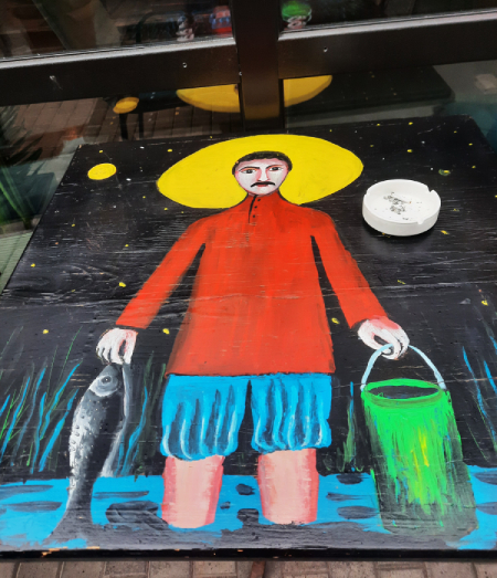 Pirosmanijev ribar na stolu restorana